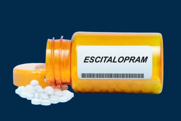 Escitalopram: Uso, Efeitos Colaterais, e Mais 3 Caixa de comprimidos de Escitalopram